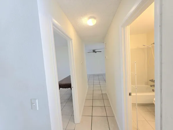 a bathroom with a sink and a shower