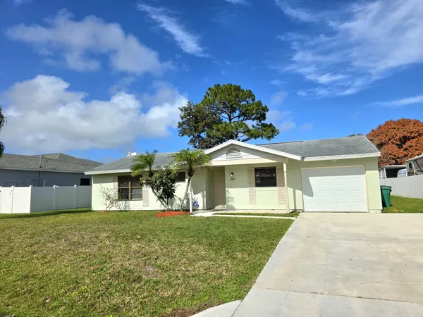 a front view of house with yard
