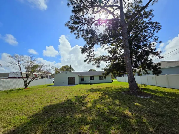 a view of a house with a big yard