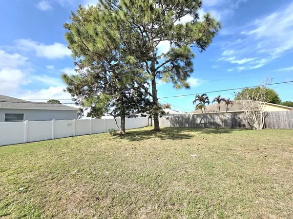a view of backyard with green space
