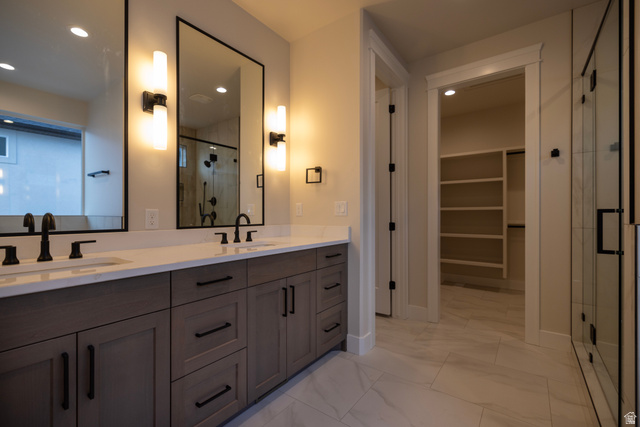 904 South 1900 West Layton, UT 84041 - Photo 13 of 19 Master Bathroom with double vanity, a walk in closet, and recessed lighting