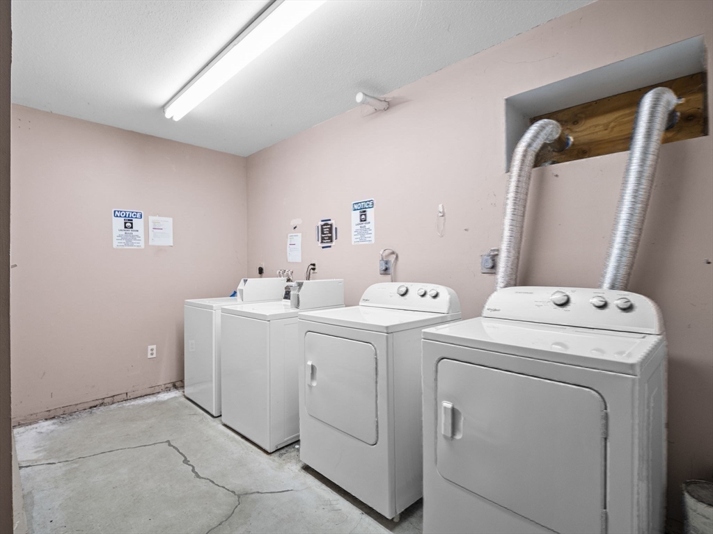 35 Cedar Street, Unit 6 Gardner, MA 01440 - Photo 34 of 39 a utility room with dryer and washer