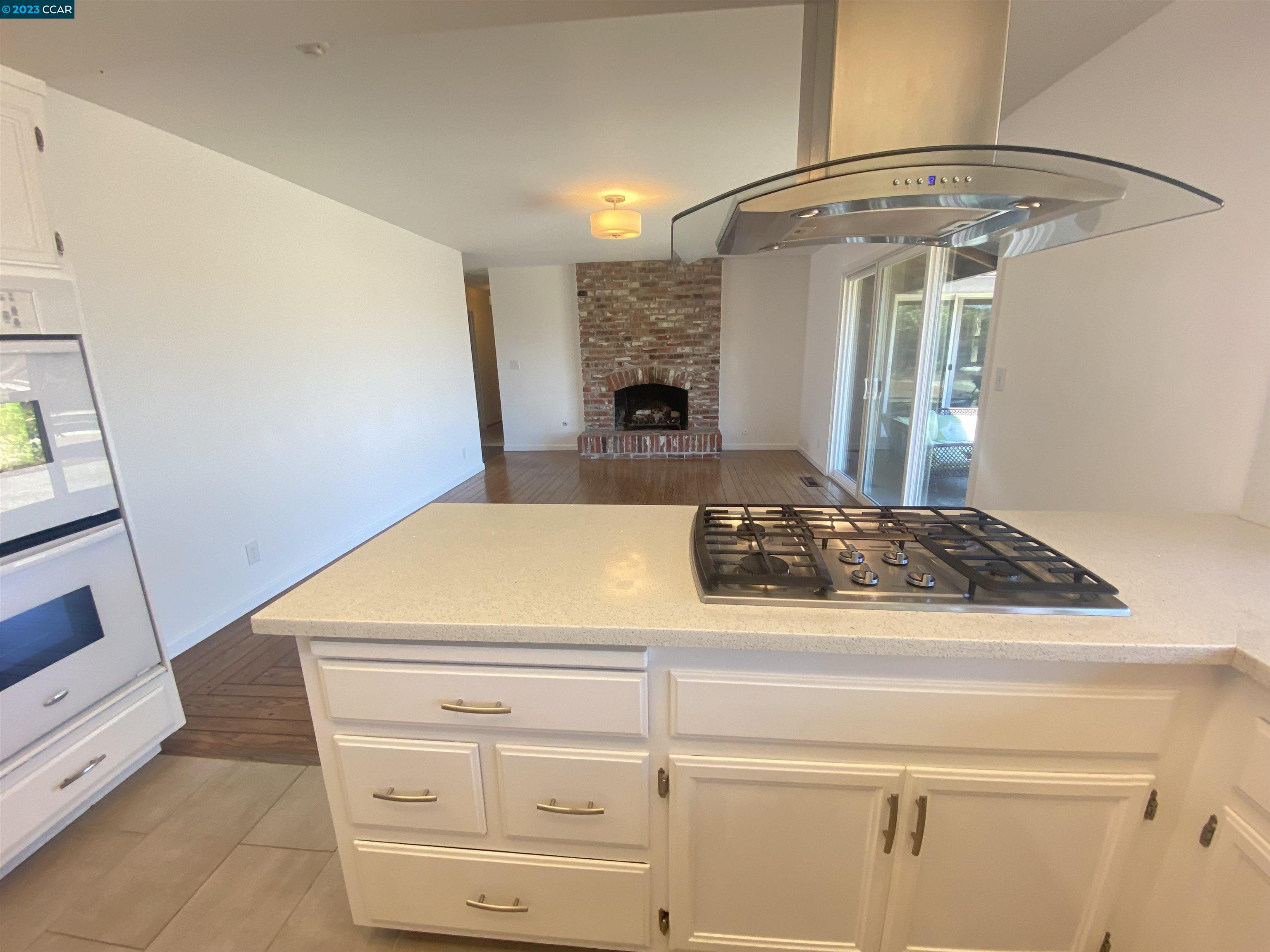 269 Birchwood Drive Moraga, CA 94556 - Photo 12 of 43 a kitchen with a stove and a cabinet