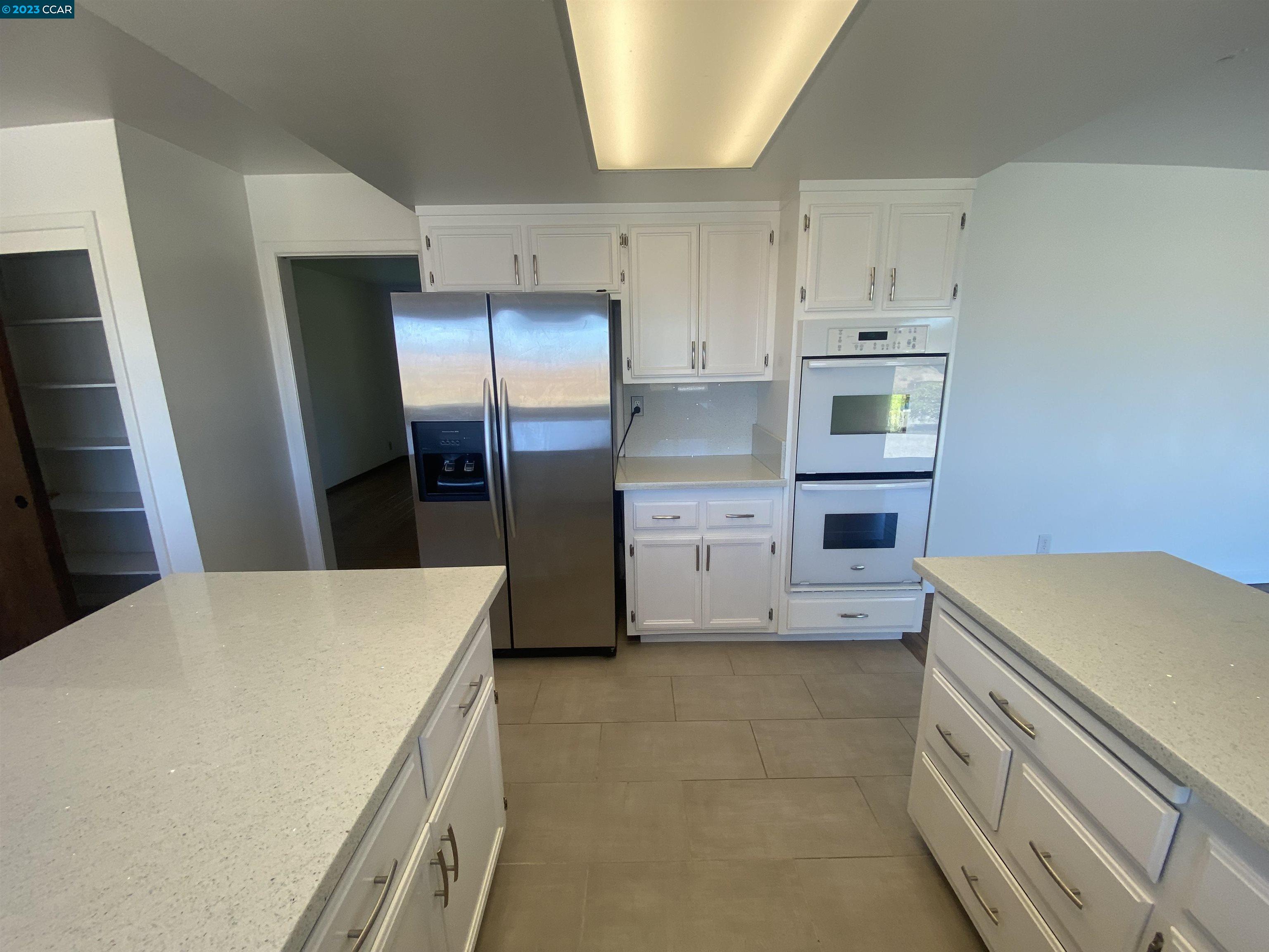 269 Birchwood Drive Moraga, CA 94556 - Photo 15 of 43 a kitchen with a stove a refrigerator and a sink