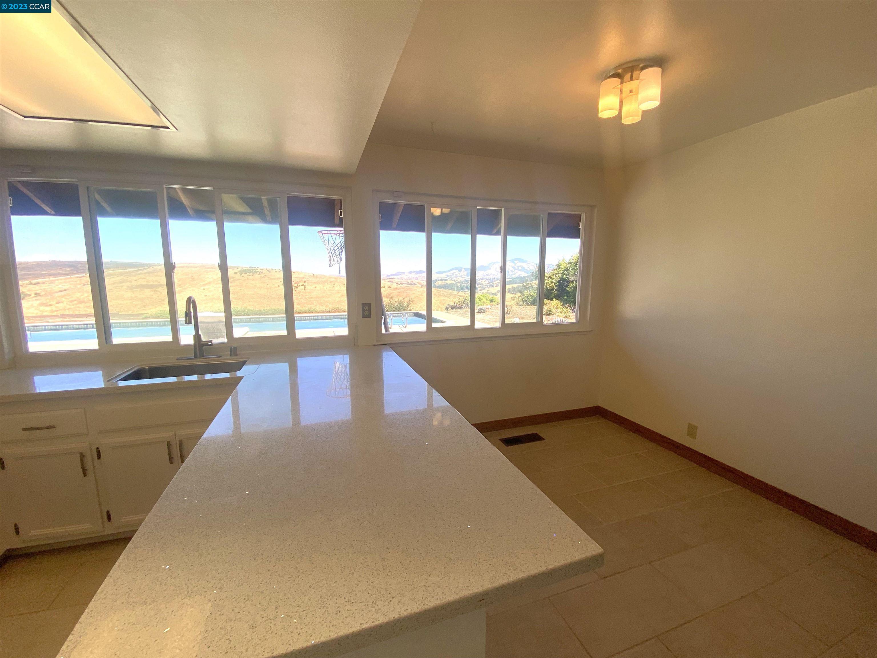 269 Birchwood Drive Moraga, CA 94556 - Photo 19 of 43 wooden floor in an empty room with a window