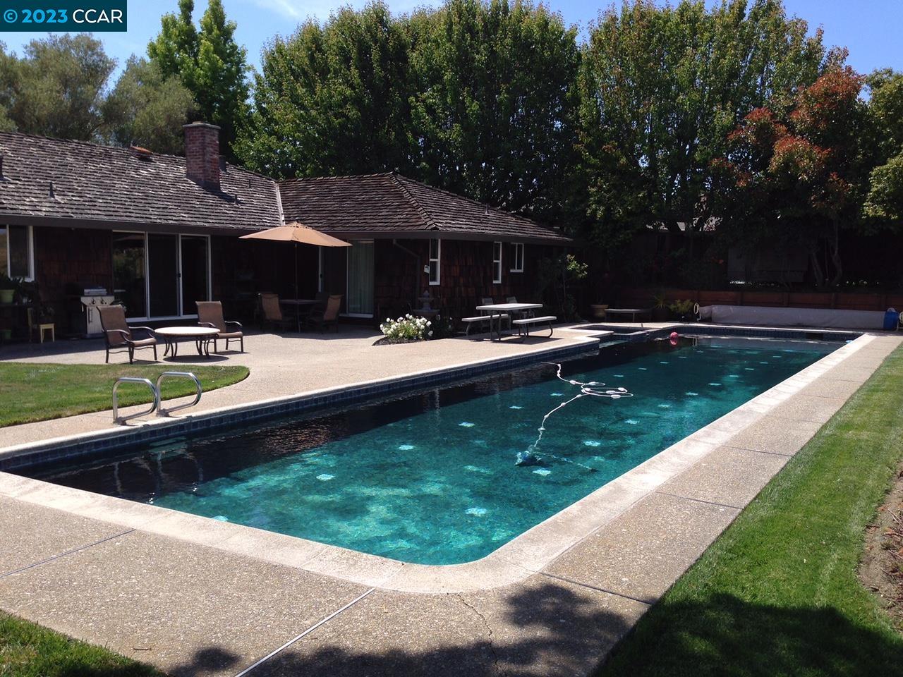 269 Birchwood Drive Moraga, CA 94556 - Photo 25 of 43 a view of a house with swimming pool and a yard