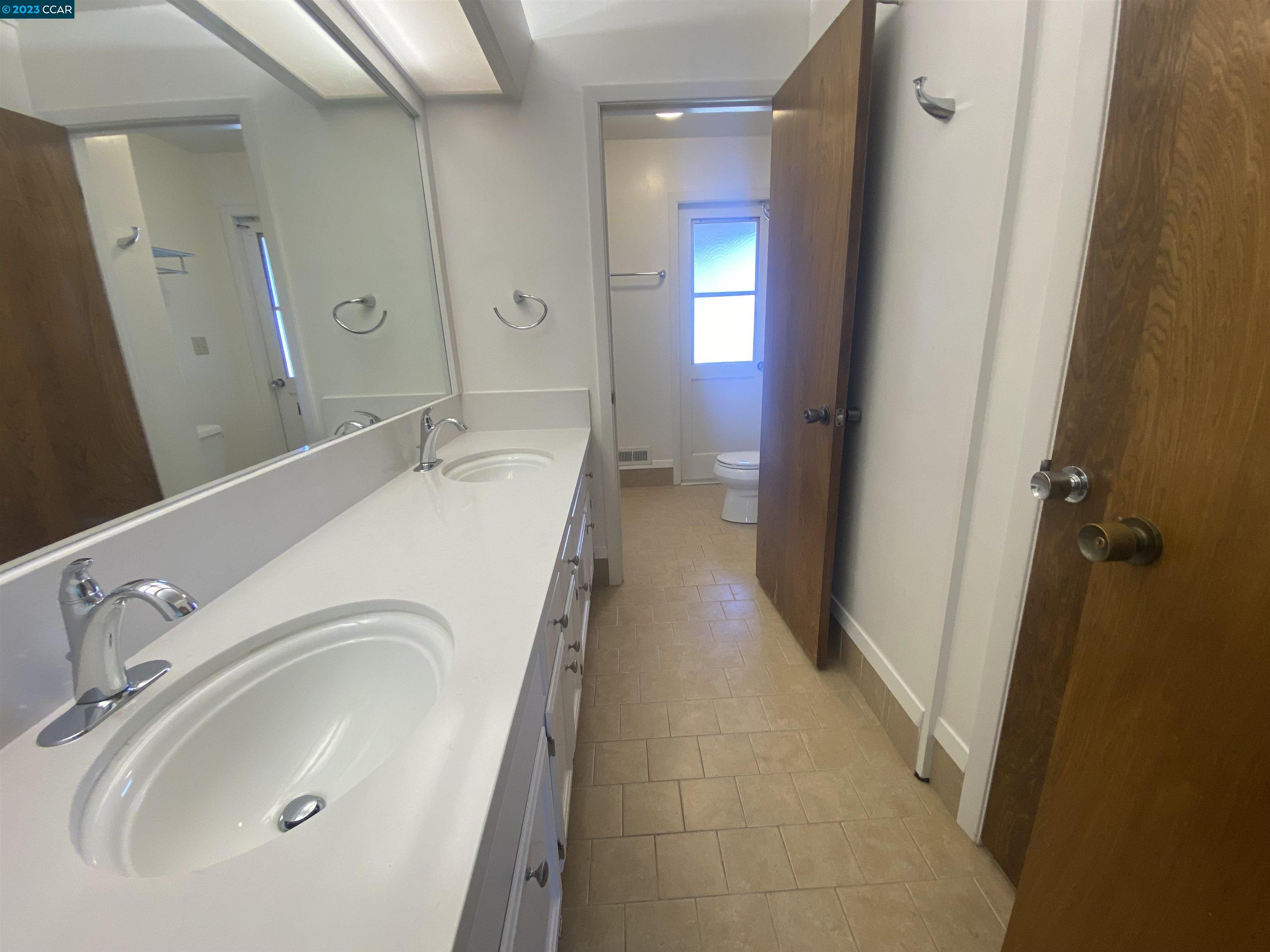 269 Birchwood Drive Moraga, CA 94556 - Photo 34 of 43 a bathroom with a sink a toilet and shower