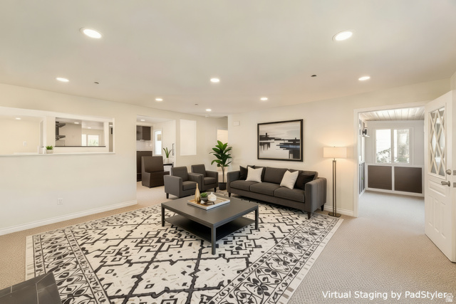 4658 Box Elder Street Salt Lake City, UT 84107 - Photo 2 of 17 Open-concept living area featuring recessed lighting, light-toned carpeting, and a pass-through window to the kitchen