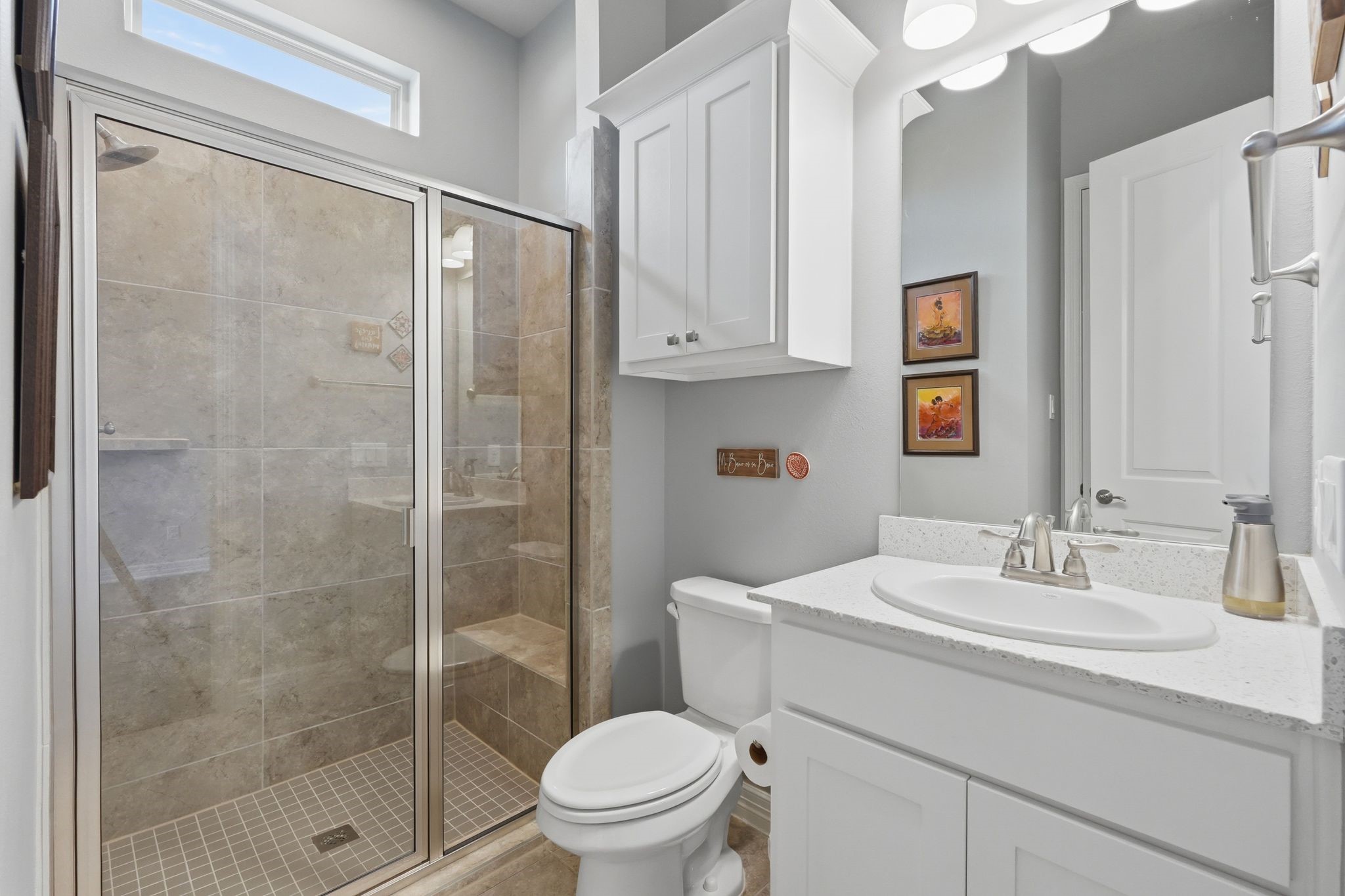 27705 South Slate Hills Lane Spring, TX 77386 - Photo 7 of 45 Pristine full bathroom down featuring a modern freestanding glass-enclosed shower.