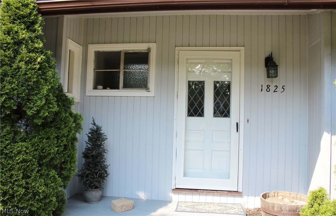 1825 Walnut Road Kent, OH 44240 - Photo 2 of 23 Come on up to the covered front stoop to enter the front door.