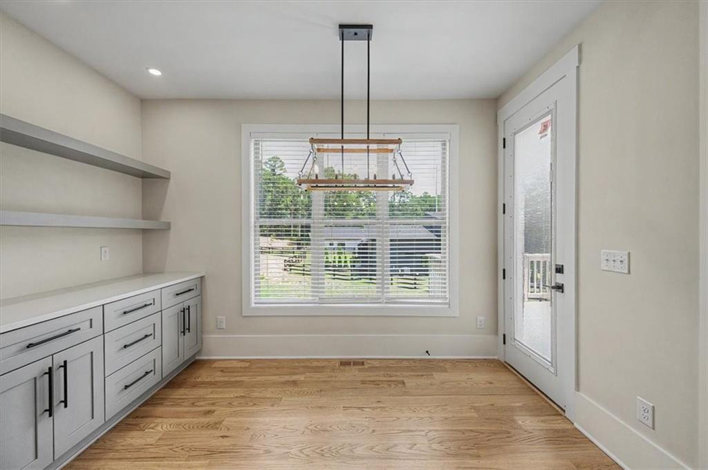 217 Laura Lake Road Marietta, GA 30066 - Photo 21 of 54 a view of an empty room with window and kitchen view