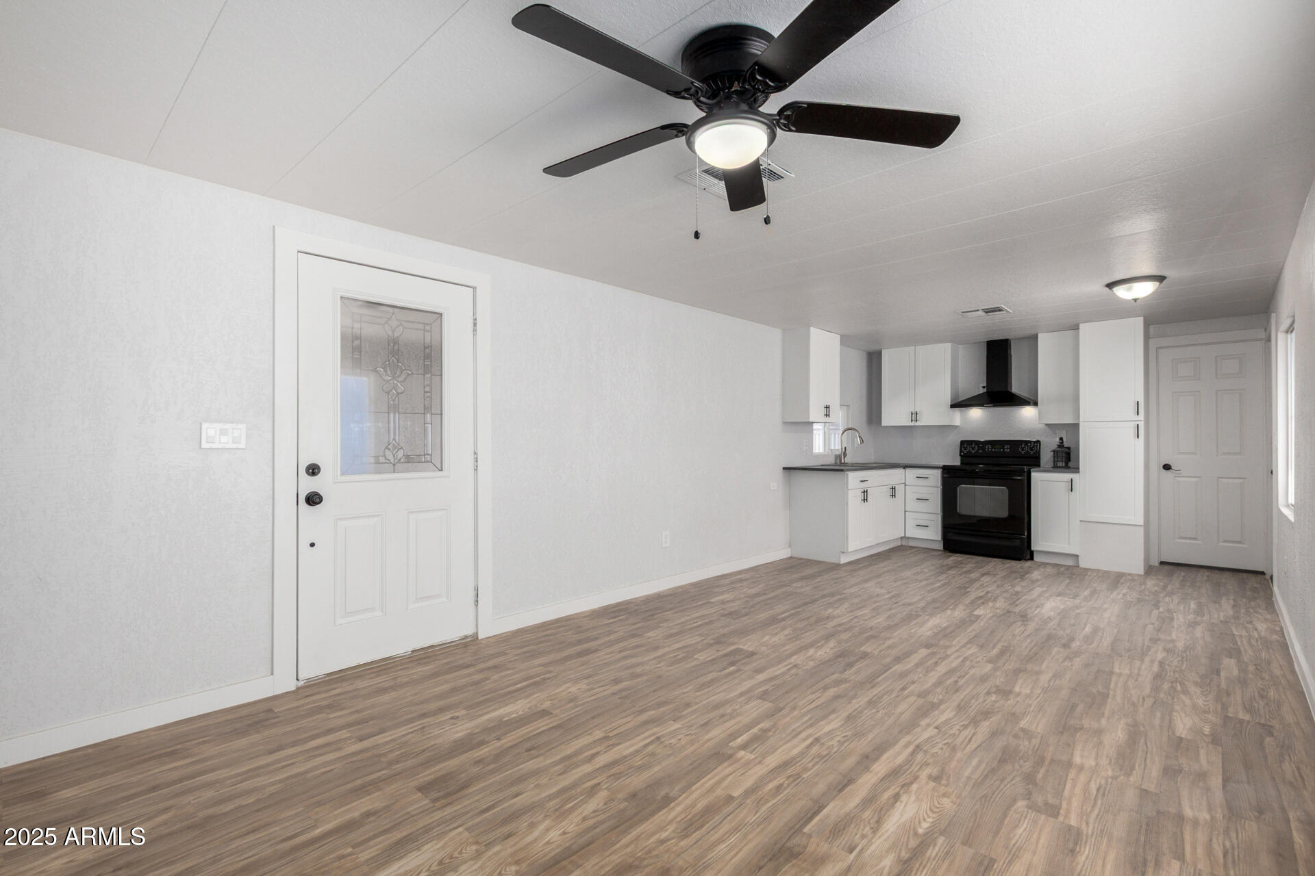 2050 West Dunlap Avenue, Unit D42 Phoenix, AZ 85021 - Photo 5 of 30 a view of a kitchen with a sink and cabinet area