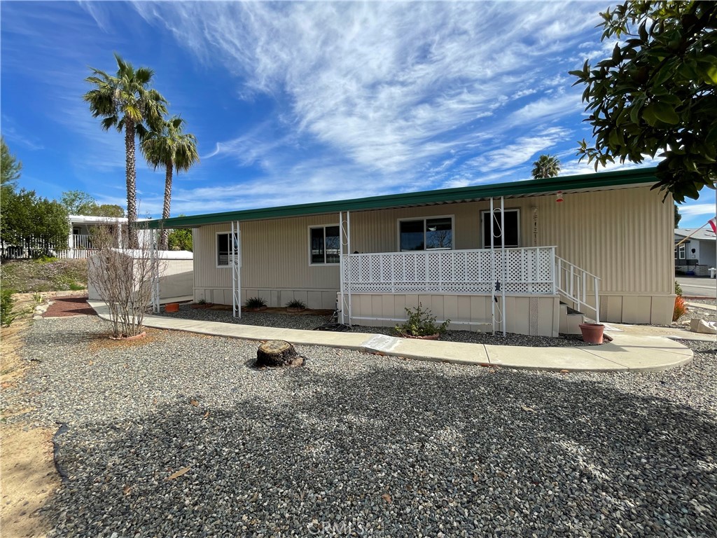 31130 South General Kearny Road, Unit 145 Temecula, CA 92591 - Photo 3 of 27 a house view with a backyard space