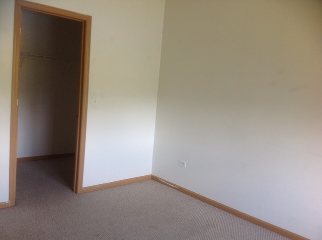 1588 McClure Road, Unit 1588 Aurora, IL 60505 - Photo 8 of 8 a view of an empty room