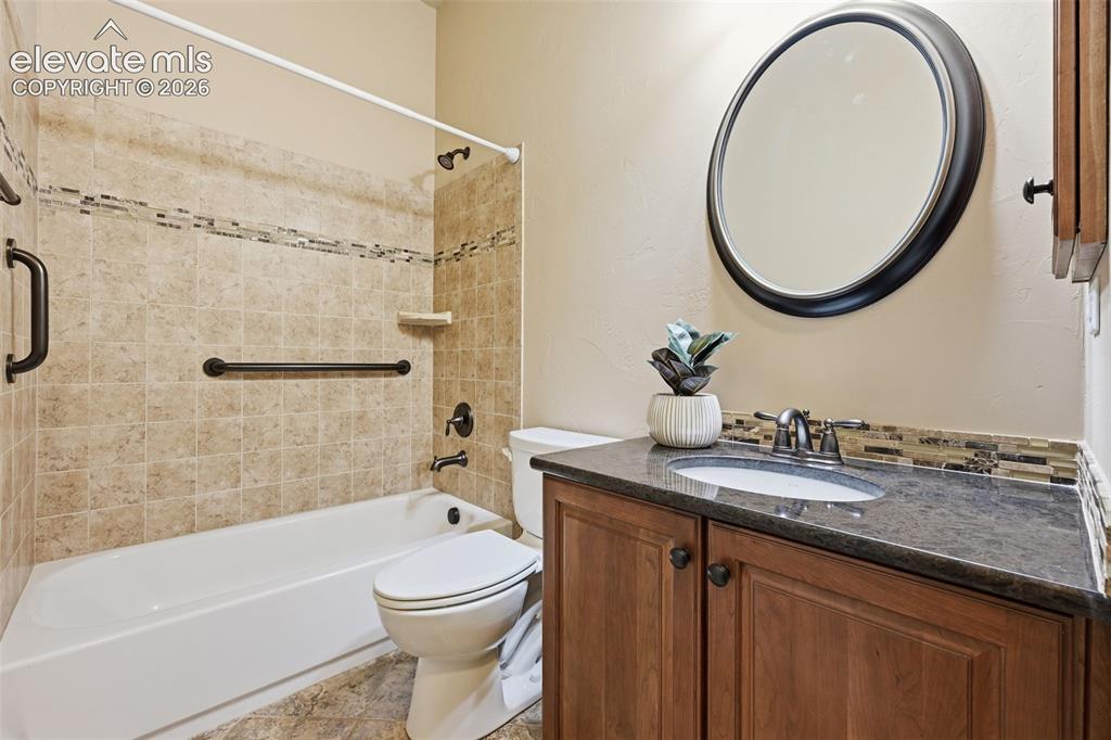 13184 Cake Bread Heights Colorado Springs, CO 80921 - Photo 28 of 47 Main level full bath with upgraded countertops