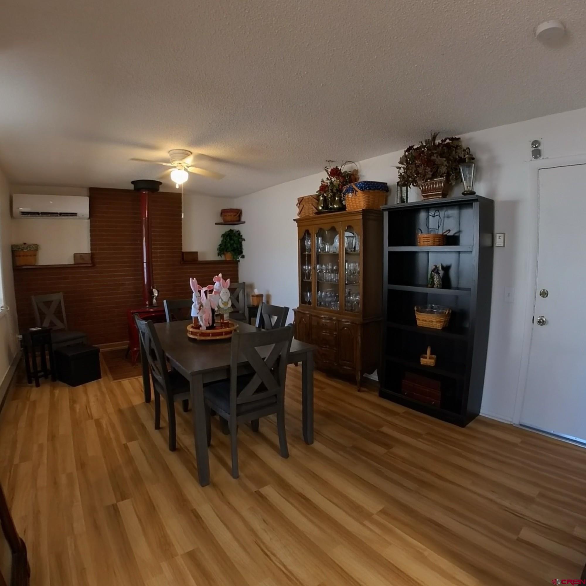 12365 East Spring Circle Eckert, CO 81418 - Photo 13 of 34 a view of a dining room with furniture and wooden floor