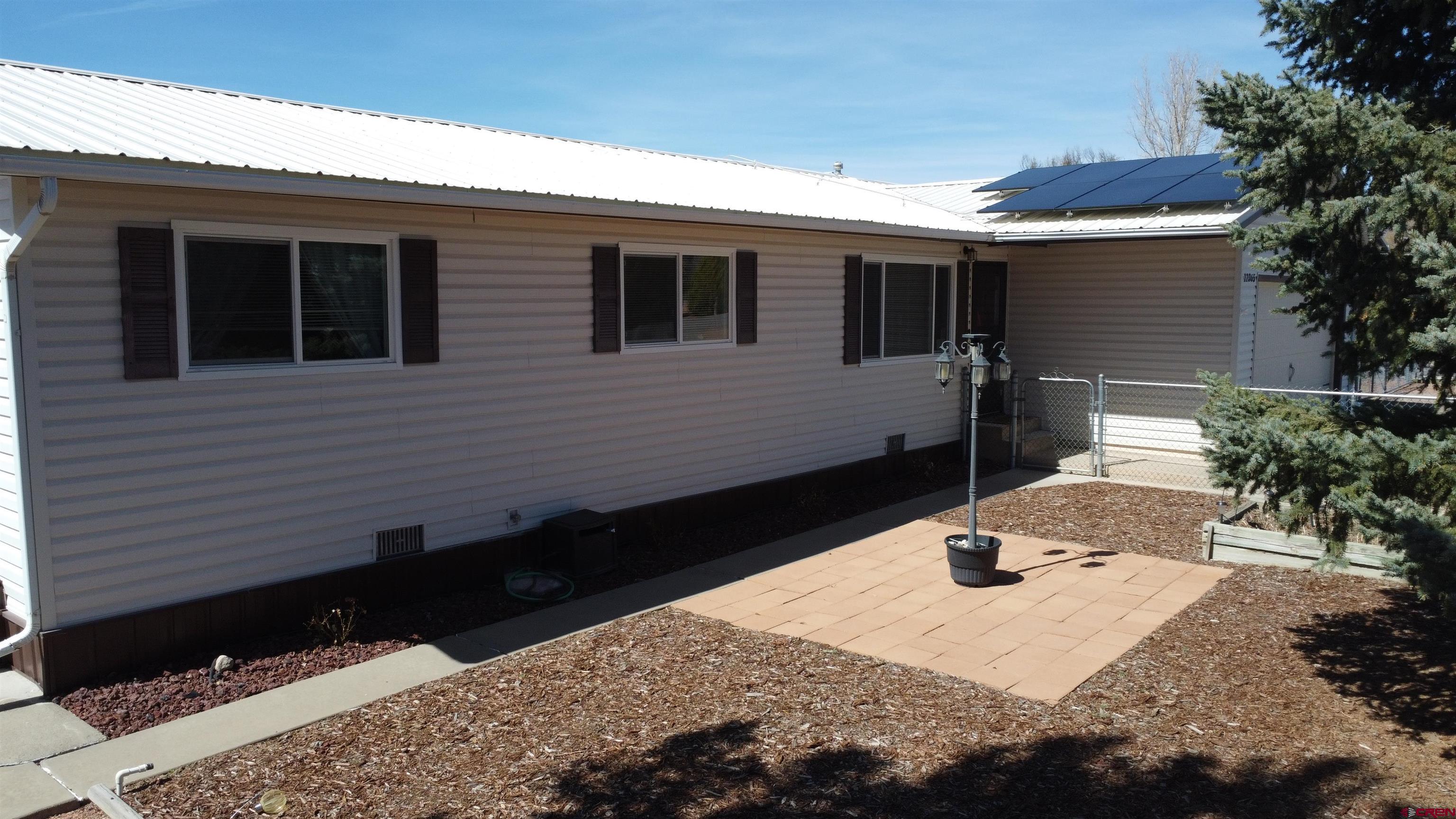 12365 East Spring Circle Eckert, CO 81418 - Photo 3 of 34 a front view of house with yard