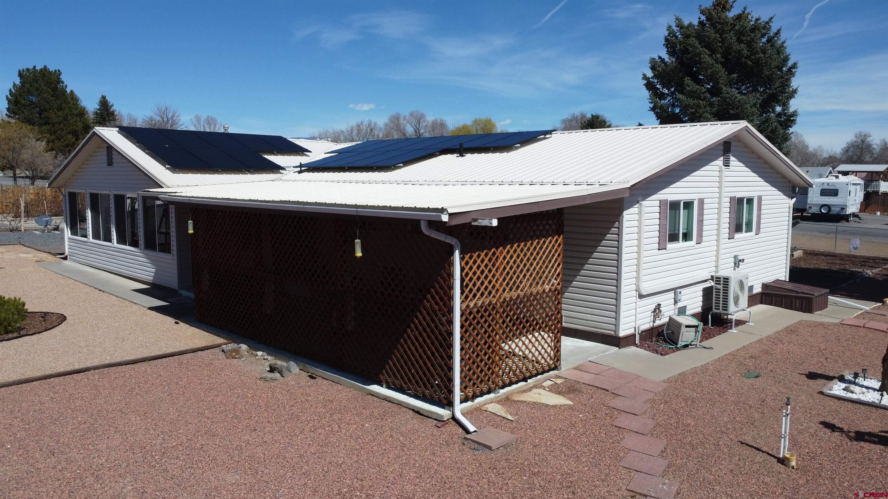 12365 East Spring Circle Eckert, CO 81418 - Photo 32 of 34 a view of a house with wooden fence