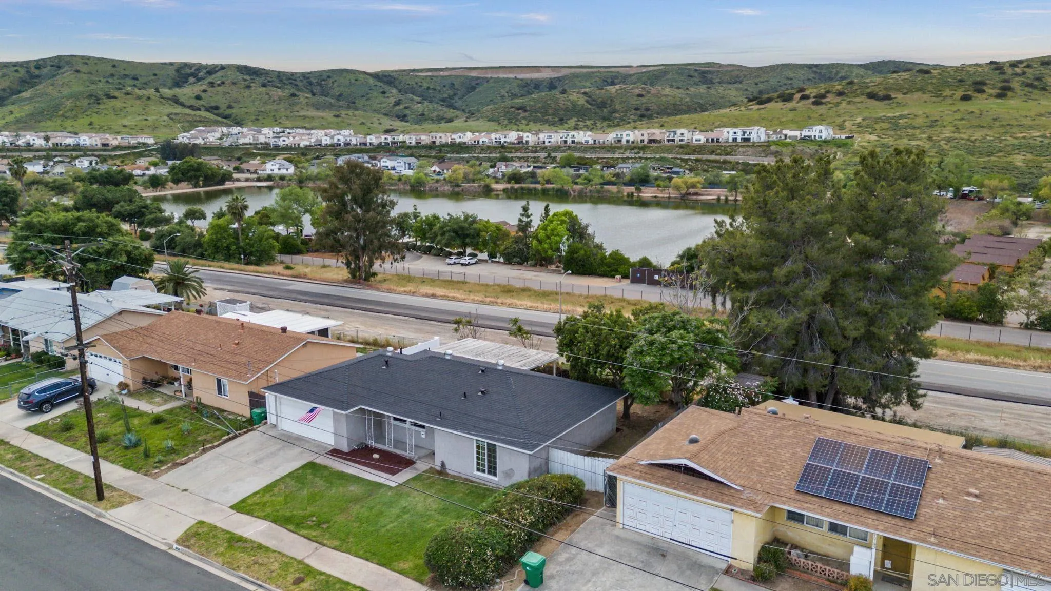 10330 Strathmore Drive Santee, CA 92071 - Photo 17 of 21 an aerial view of residential houses with outdoor space and river