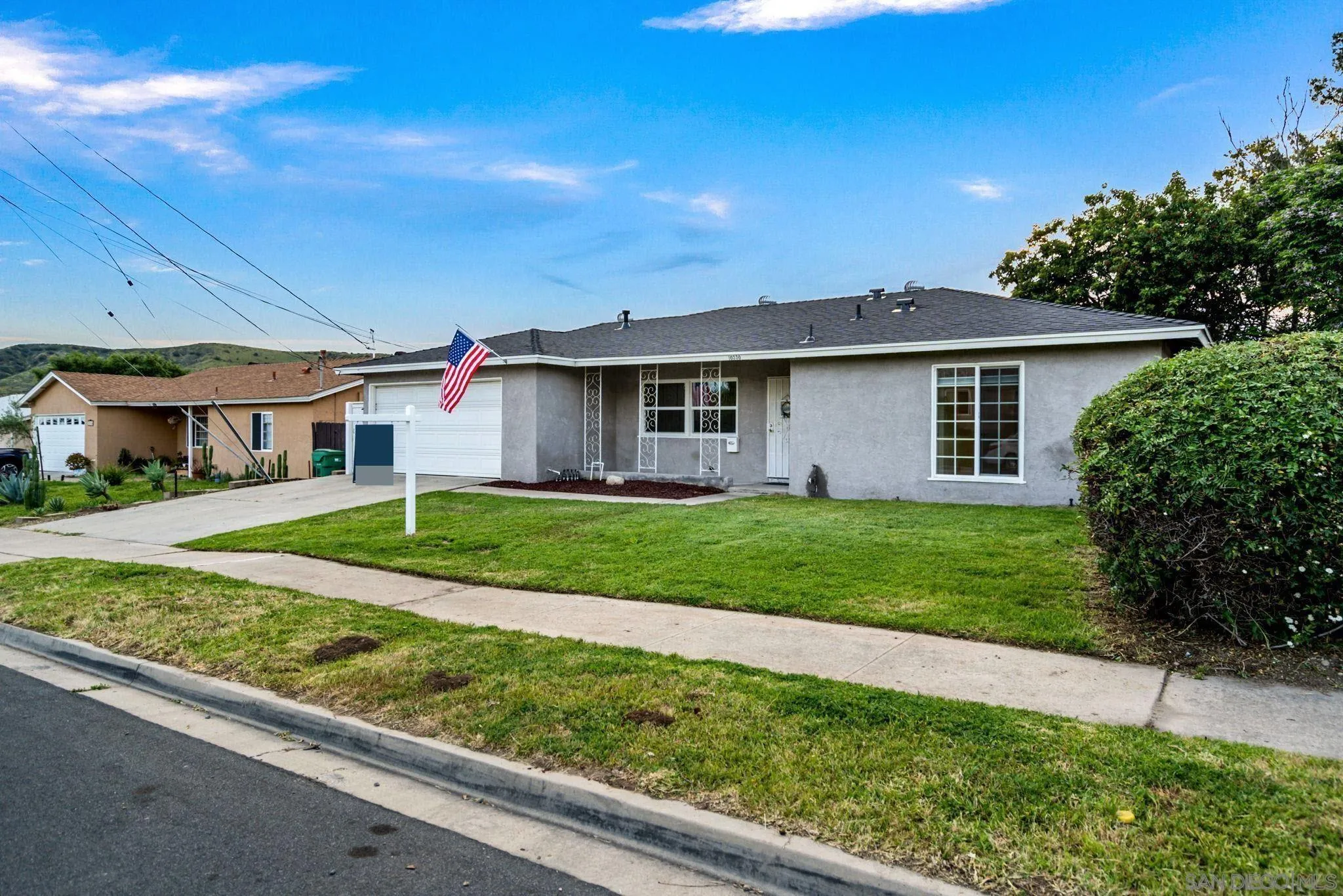10330 Strathmore Drive Santee, CA 92071 - Photo 21 of 21 a front view of house with yard and green space
