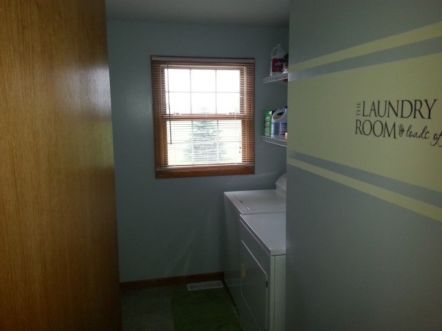 2419 Quarry Road Ashton, IL 61006 - Photo 14 of 25 a bathroom with a sink and a window
