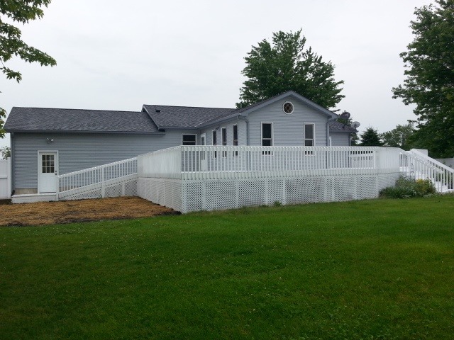 2419 Quarry Road Ashton, IL 61006 - Photo 17 of 25 a front view of a house with a yard