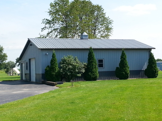 2419 Quarry Road Ashton, IL 61006 - Photo 20 of 25 a view of a house with a yard and tree