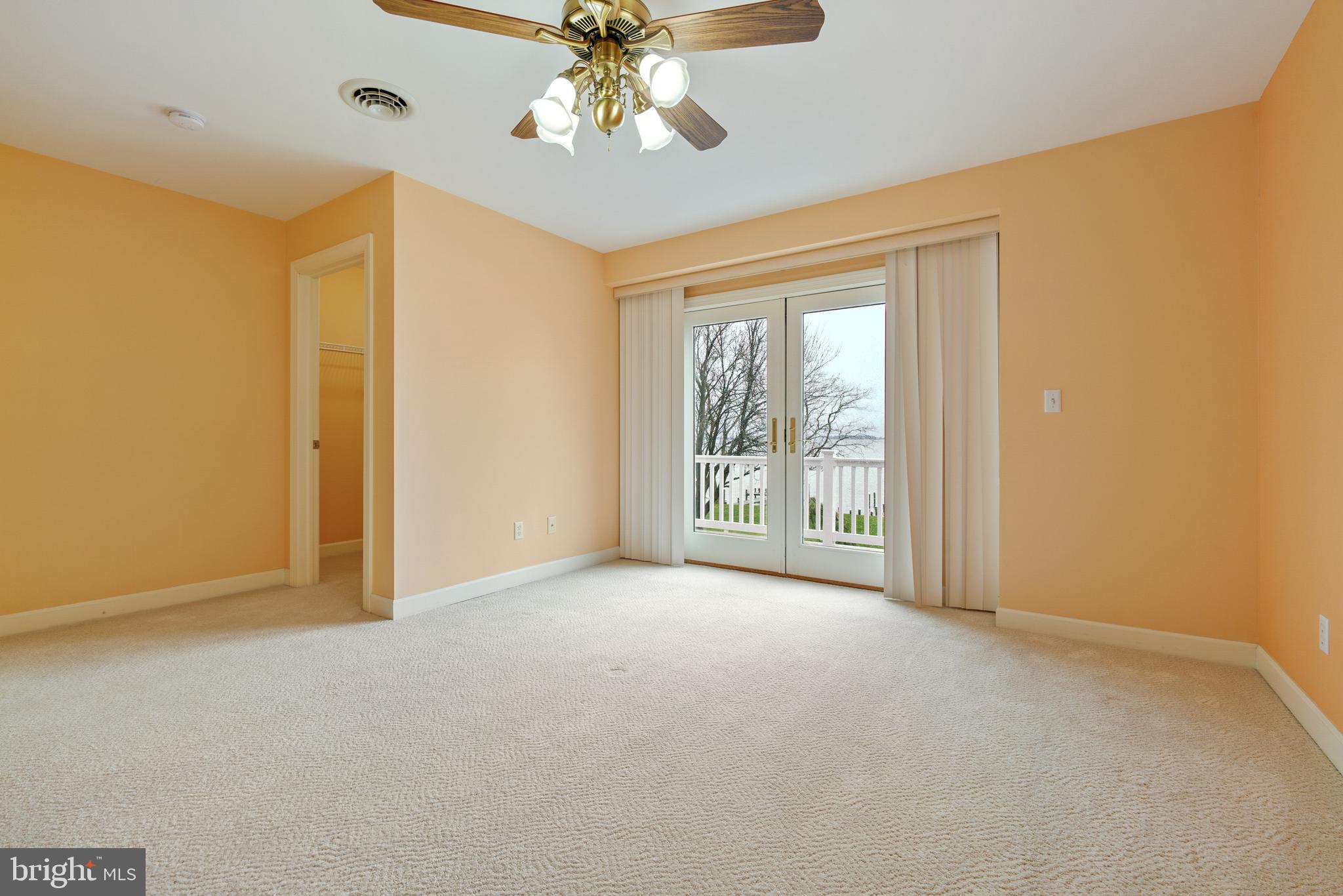 2817 Cox Neck Road Chester, MD 21619 - Photo 27 of 35 a view of an empty room with a window