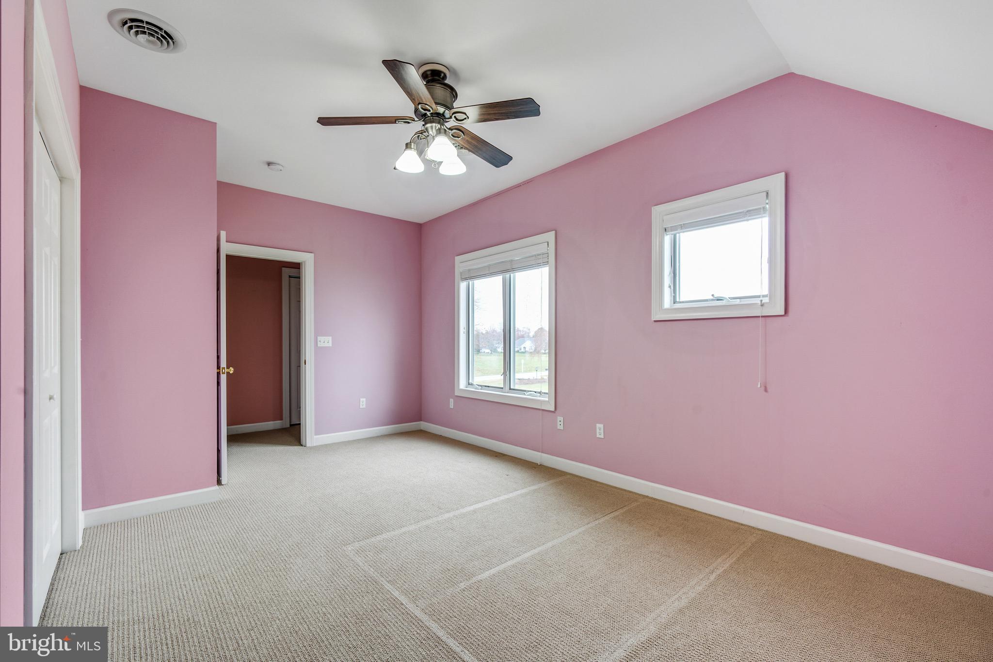 2817 Cox Neck Road Chester, MD 21619 - Photo 30 of 35 a view of livingroom with a ceiling fan and window