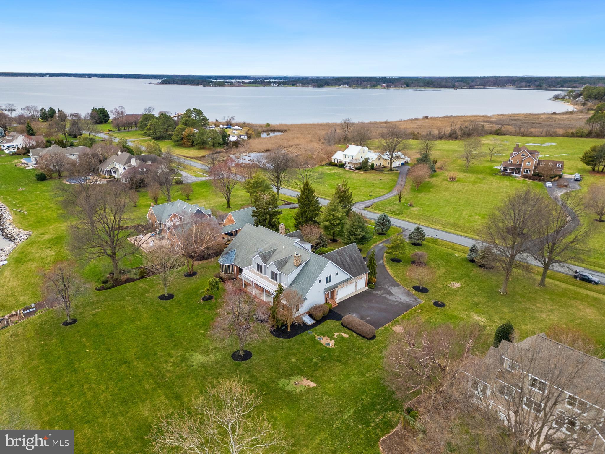 2817 Cox Neck Road Chester, MD 21619 - Photo 7 of 35 a view of a lake with houses