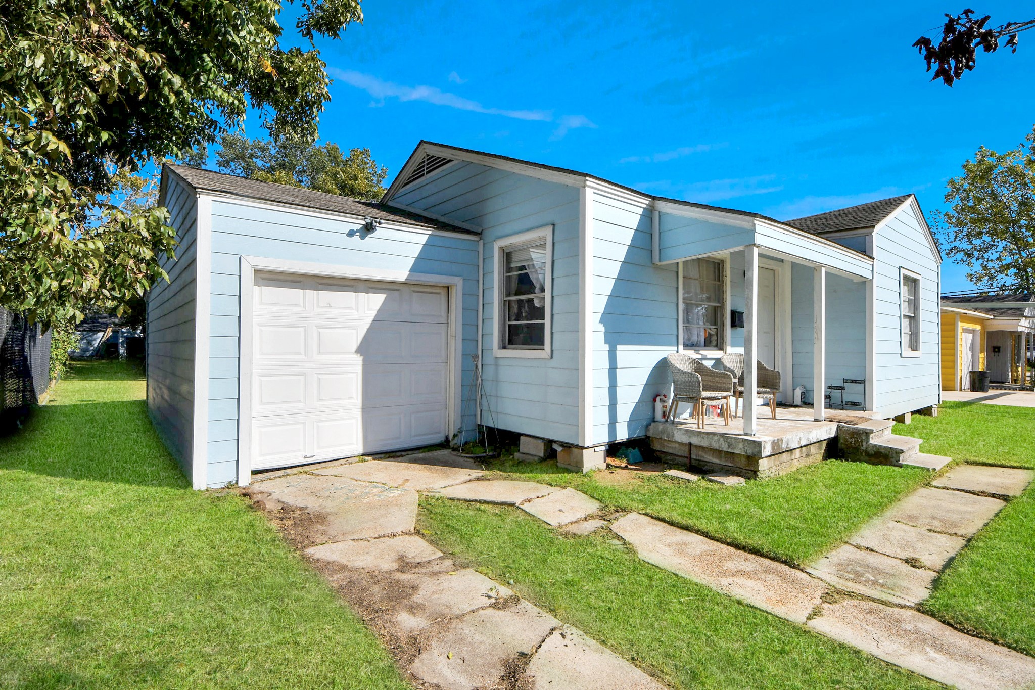11025 Muscatine Street Houston, TX 77029 - Photo 22 of 33 a view of a house with yard and a garden