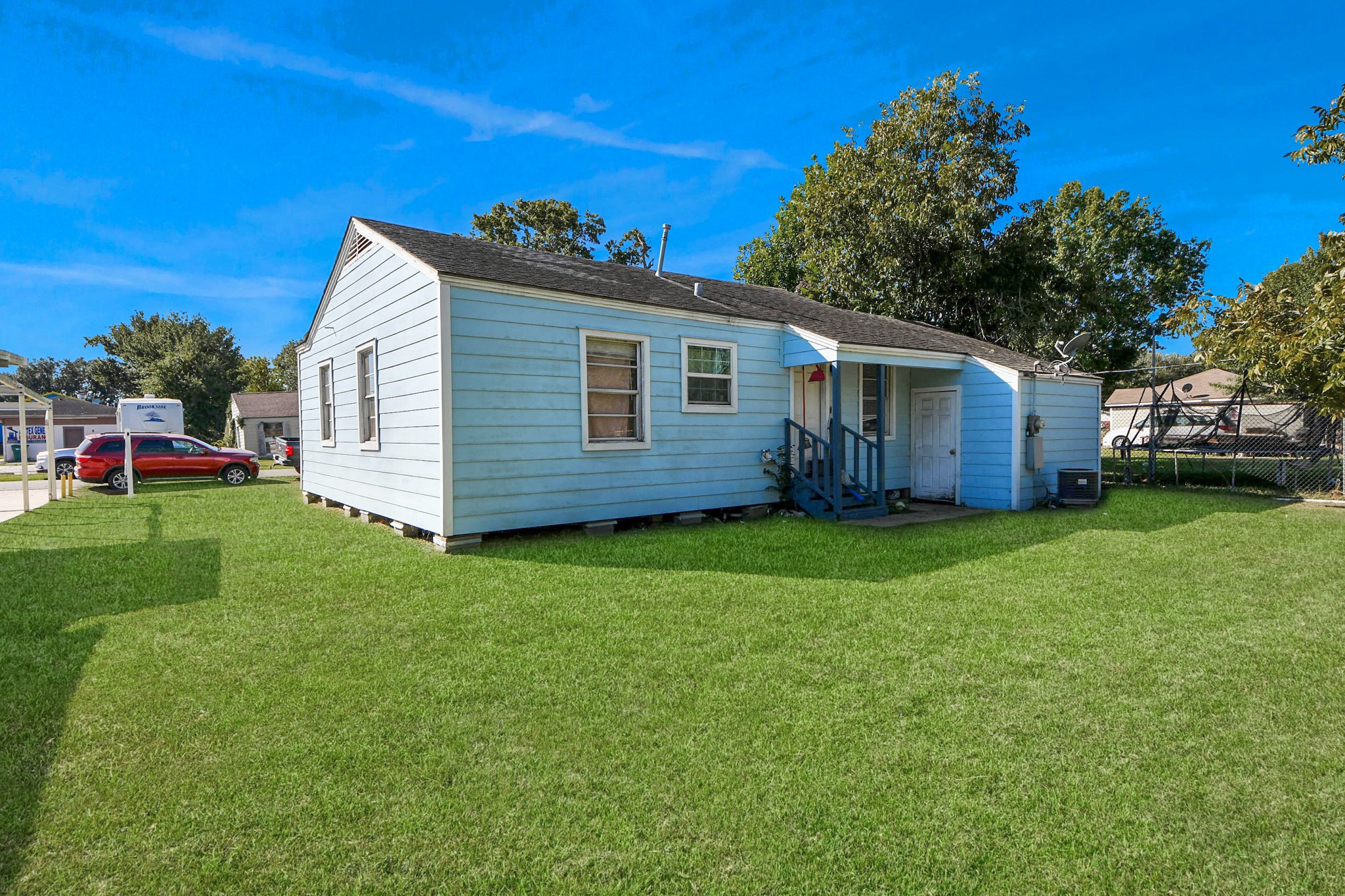 11025 Muscatine Street Houston, TX 77029 - Photo 27 of 33 a view of a house with a backyard