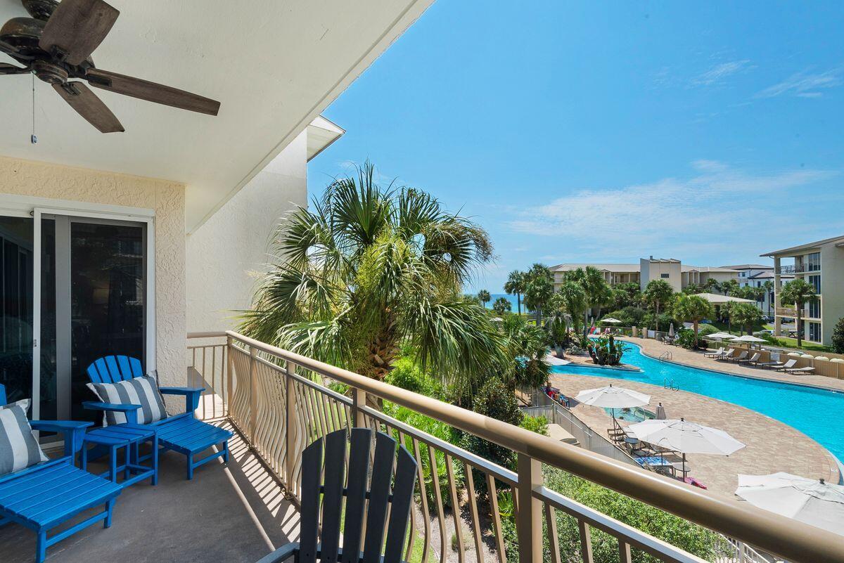 10254 East County Road, Unit 315 Inlet Beach, FL 32461 - Photo 1 of 37 a view of a balcony with chairs