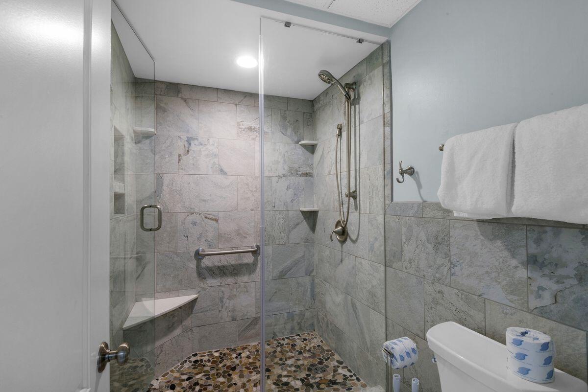 10254 East County Road, Unit 315 Inlet Beach, FL 32461 - Photo 23 of 37 a bathroom with a shower and a toilet
