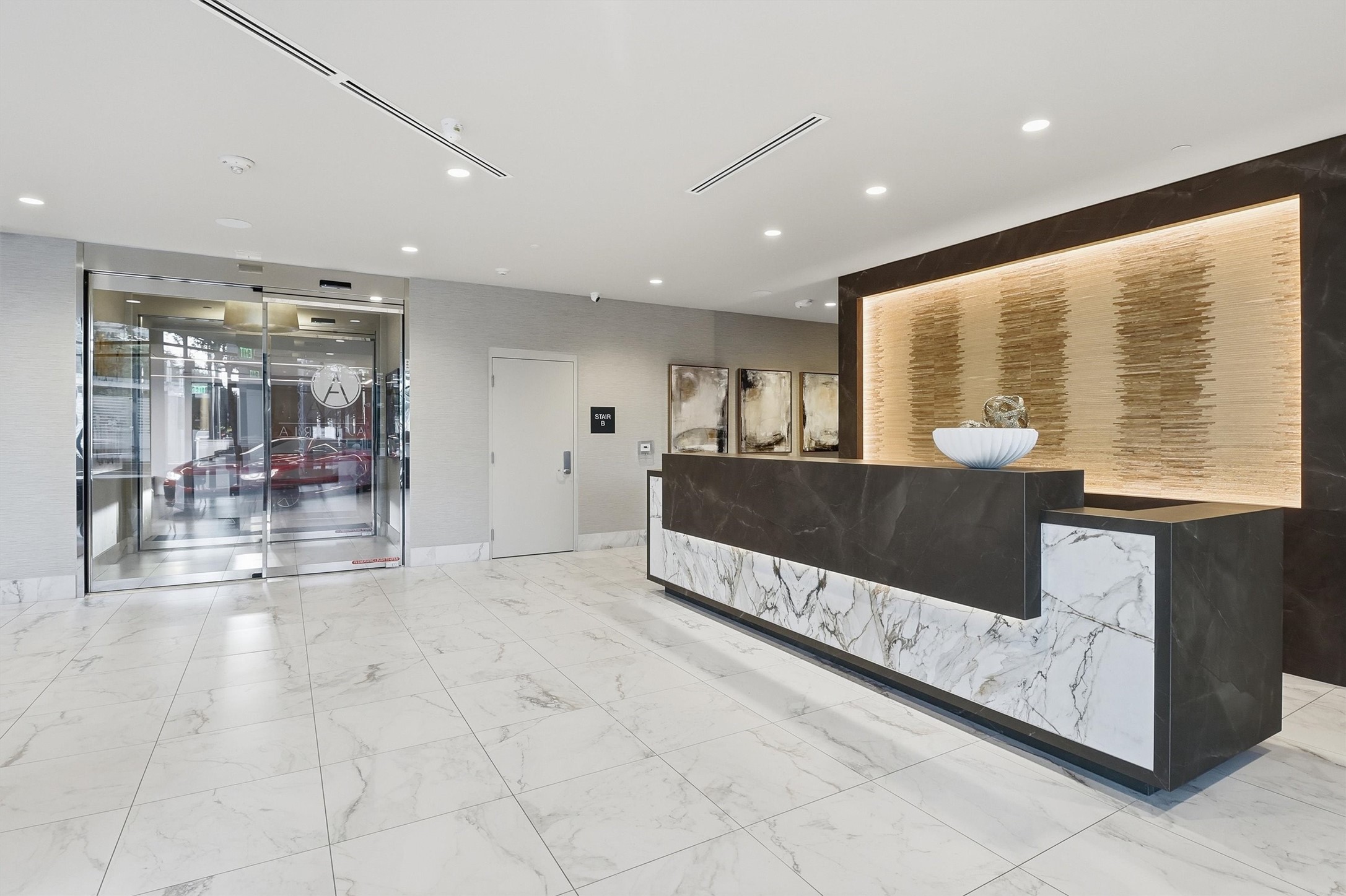 1409 Post Oak Boulevard, Unit 2004 Houston, TX 77056 - Photo 4 of 49 a view of a living room and kitchen with furniture