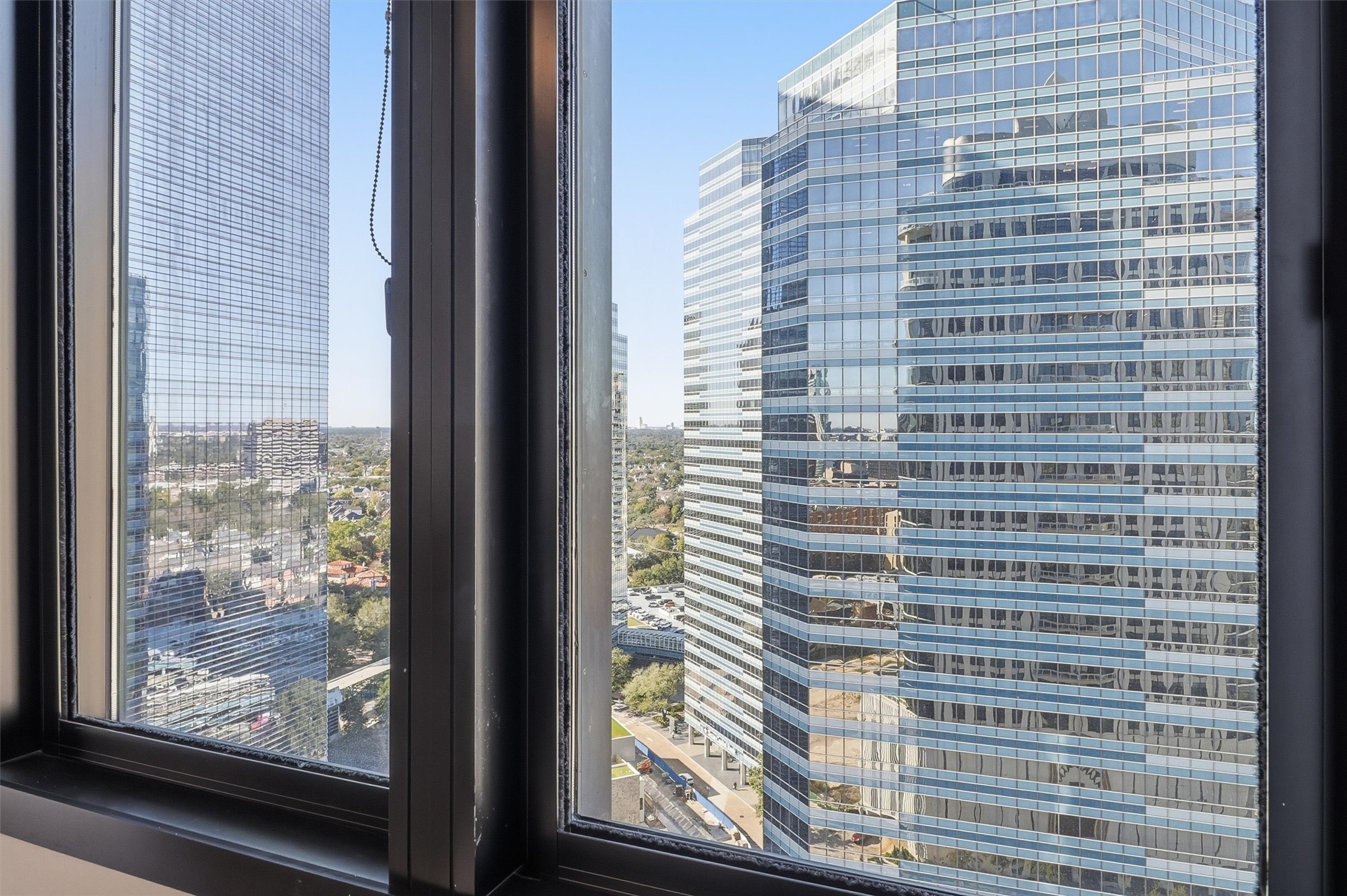 1409 Post Oak Boulevard, Unit 2004 Houston, TX 77056 - Photo 41 of 49 a view of entryway with a glass door