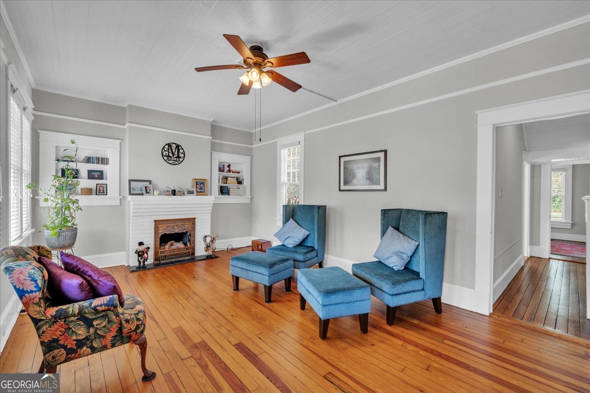 220 West Drive Dublin, GA 31021 - Photo 15 of 44 a living room with furniture and a fireplace