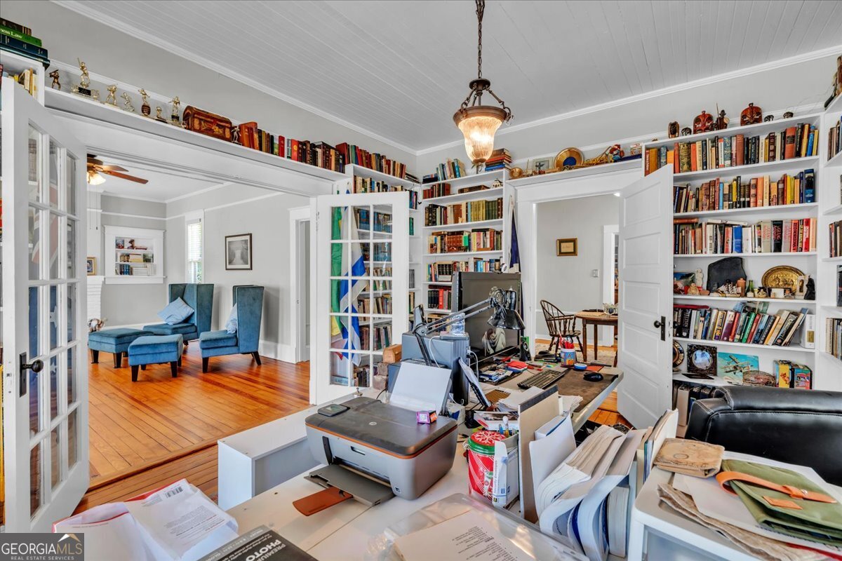 220 West Drive Dublin, GA 31021 - Photo 22 of 44 a very nice looking living room with furniture and book shelf