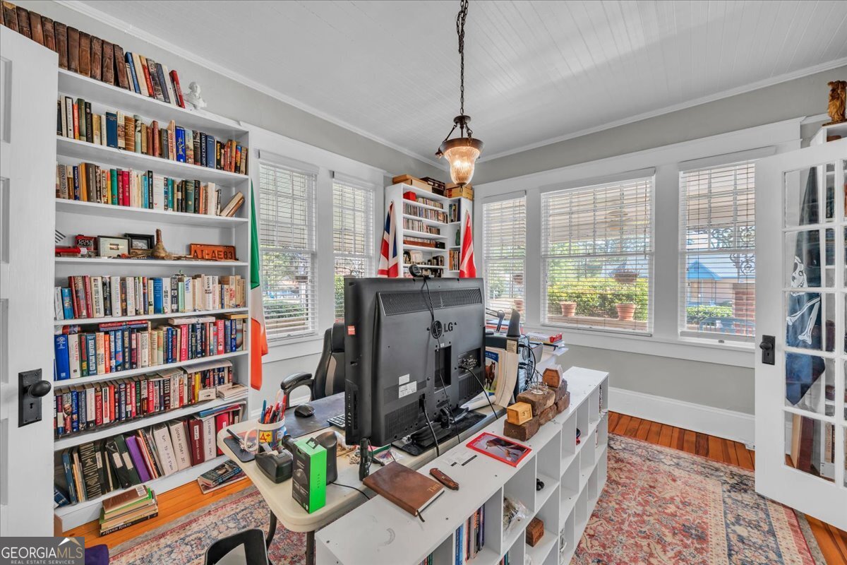 220 West Drive Dublin, GA 31021 - Photo 23 of 44 a room with furniture and a book shelf