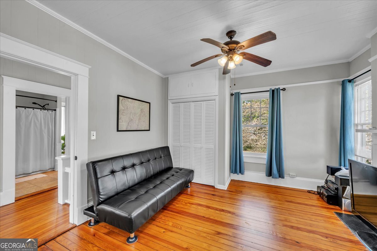 220 West Drive Dublin, GA 31021 - Photo 34 of 44 a view of room with window and wooden floor