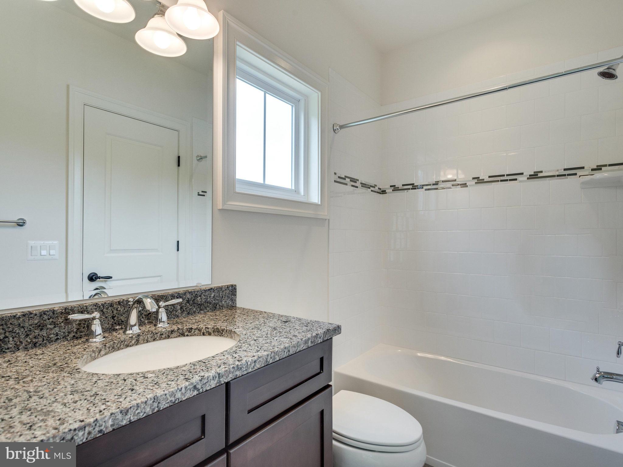 7303 Churchill Road McLean, VA 22101 - Photo 23 of 30 Bath Three