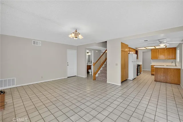 a view of a kitchen with a sink and a stove