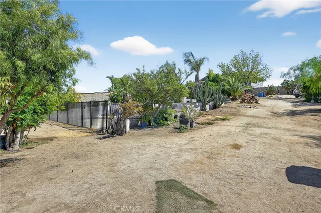 a view of a backyard of a house