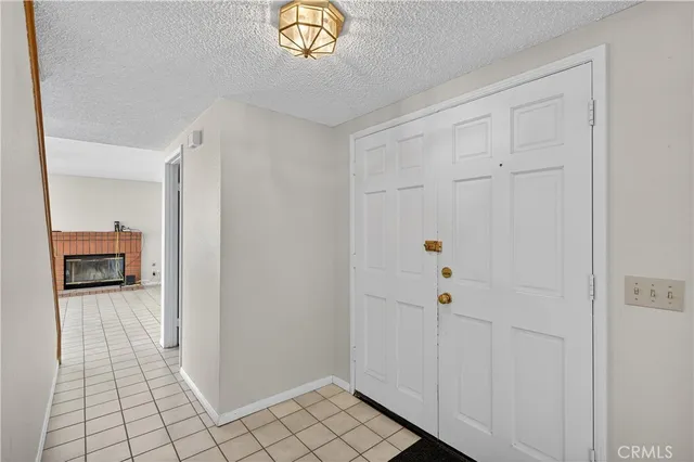 a view of a hallway view with staircase