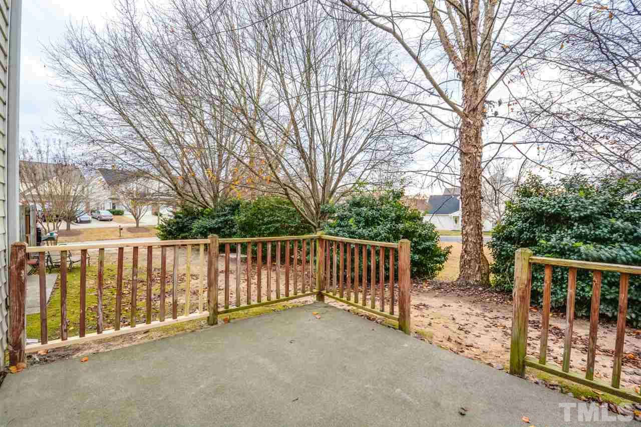 2009 Metacomet Way Raleigh, NC 27604 - Photo 12 of 15 a view of a fence with trees in the background