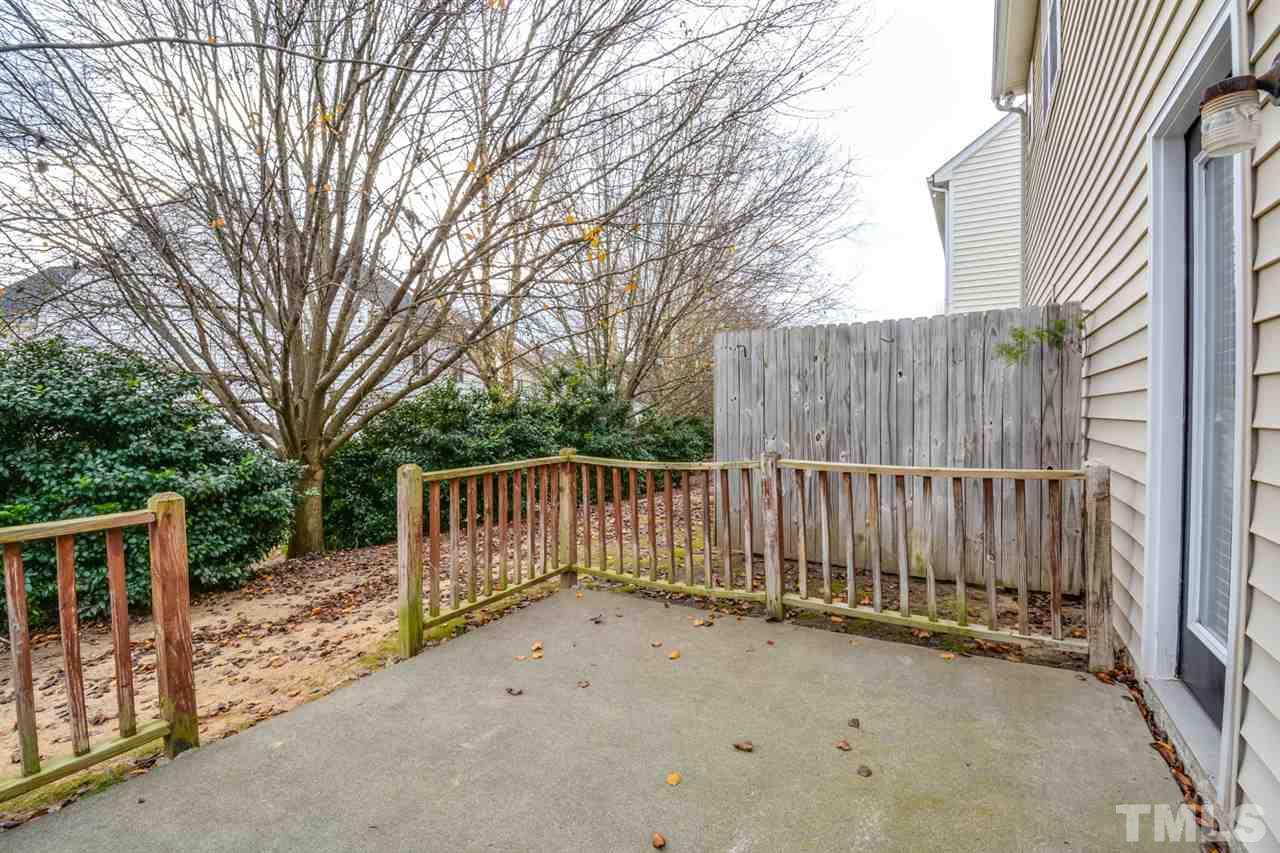 2009 Metacomet Way Raleigh, NC 27604 - Photo 13 of 15 a view of deck with wooden fence and large trees