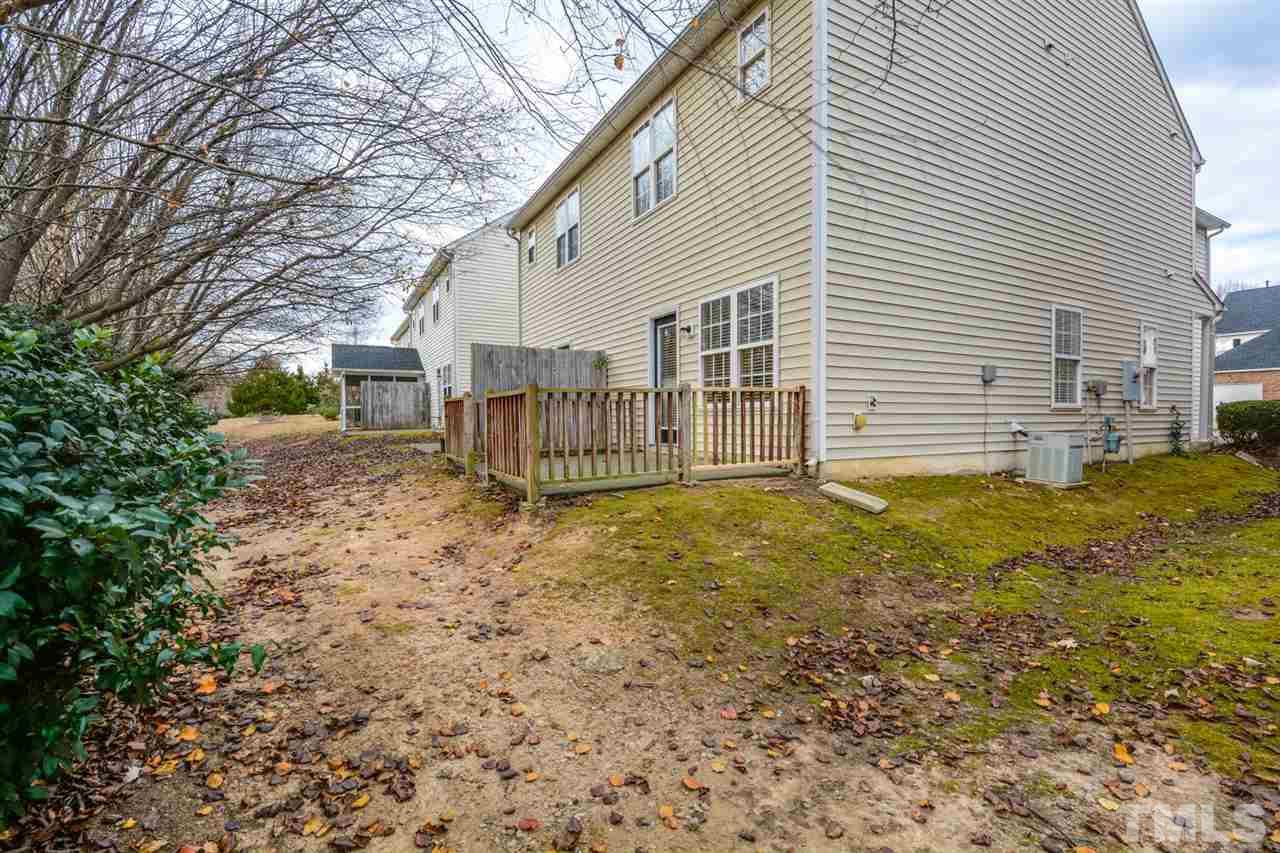 2009 Metacomet Way Raleigh, NC 27604 - Photo 15 of 15 a view of house with backyard and tree