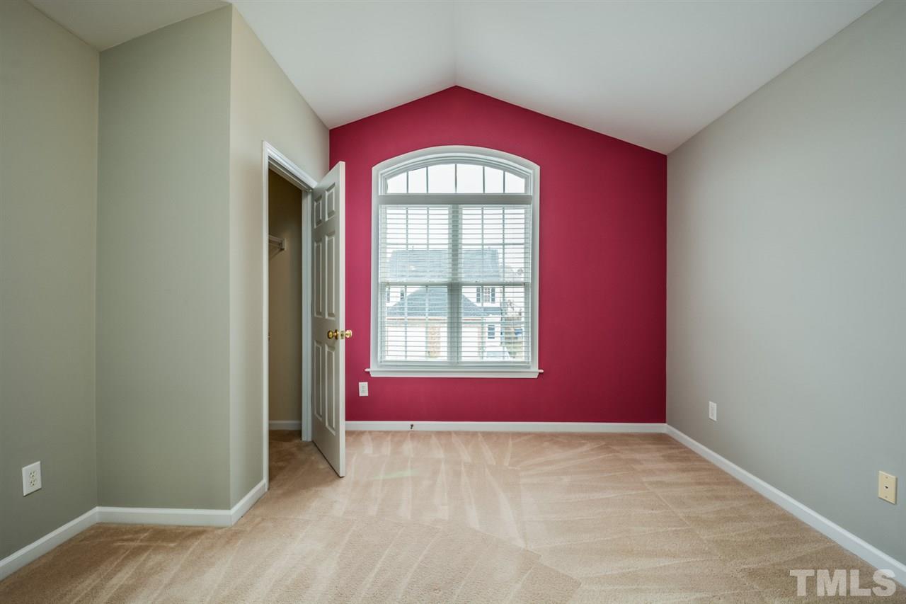 2009 Metacomet Way Raleigh, NC 27604 - Photo 10 of 15 an empty room with wooden floor and windows