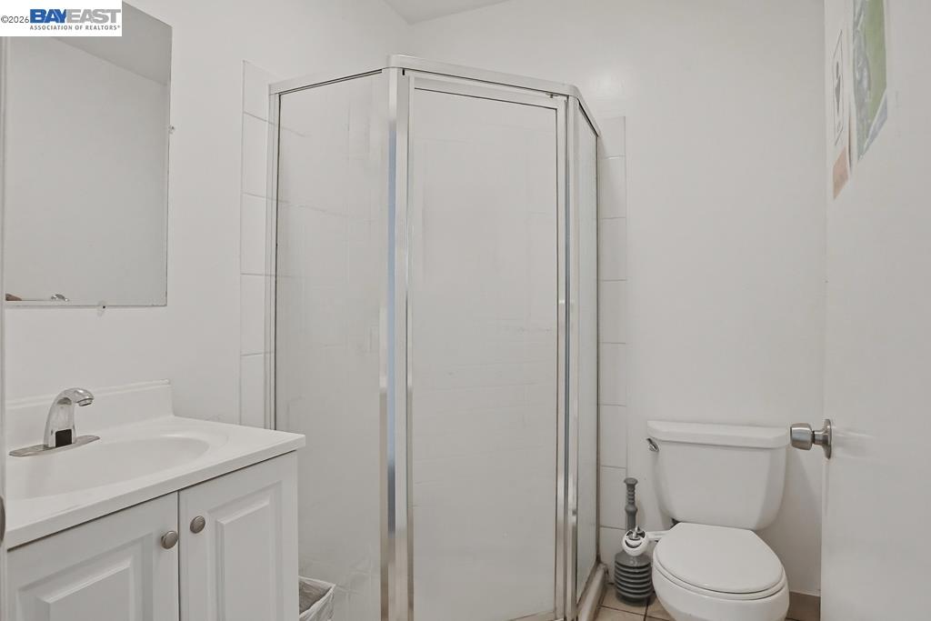 179 Los Ranchitos Road San Rafael, CA 94903 - Photo 12 of 38 a bathroom with a sink a toilet and shower