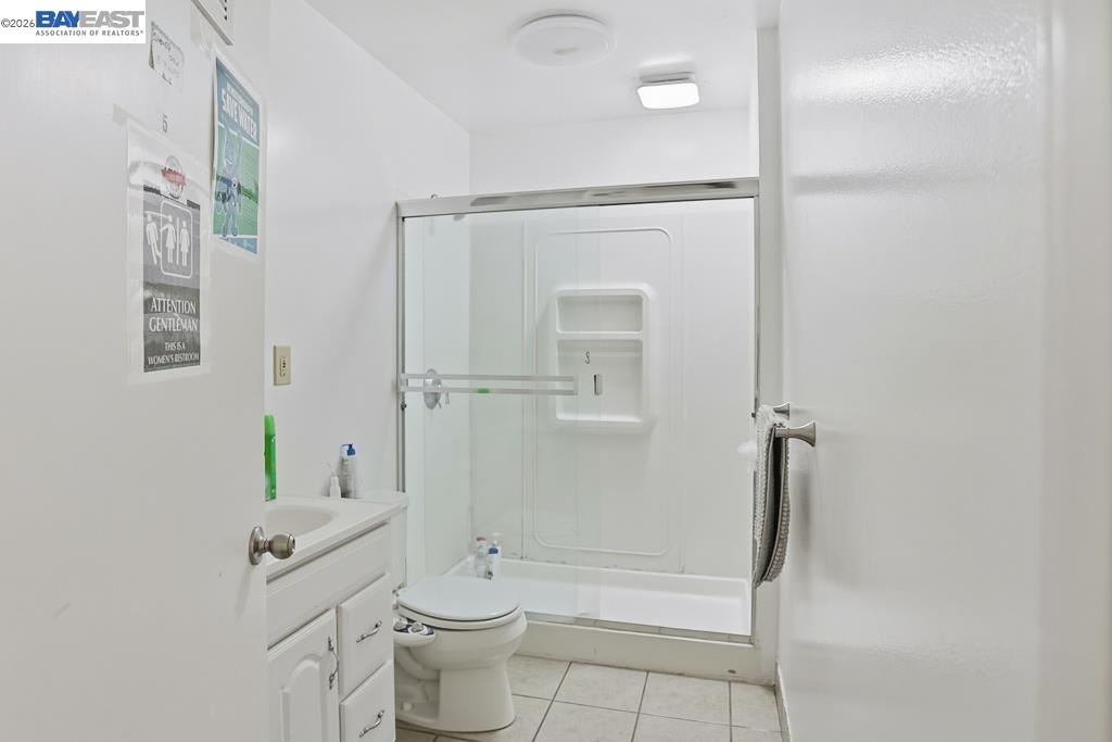 179 Los Ranchitos Road San Rafael, CA 94903 - Photo 13 of 38 a bathroom with a granite countertop bathtub shower sink vanity and toilet